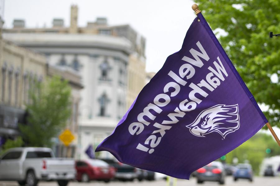 A small flag that says Welcome Warhawks